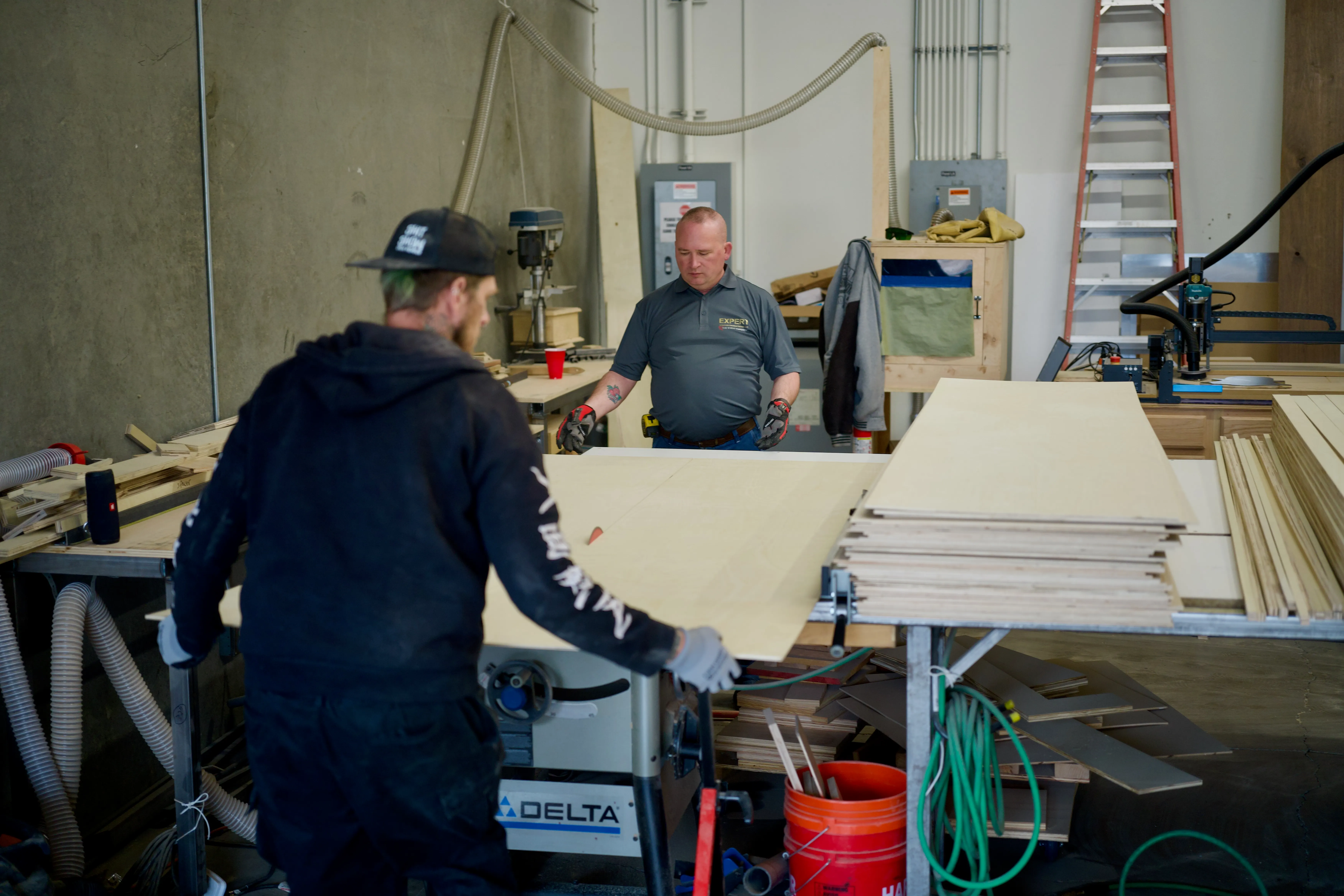 Fabrication floor at the Expert Staging Productions shop in Las Vegas, with staging decks and scenery in progress