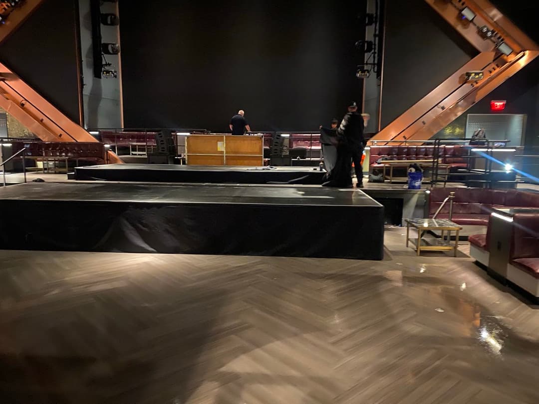 Expert Staging crew building multi-level stage at Las Vegas venue
